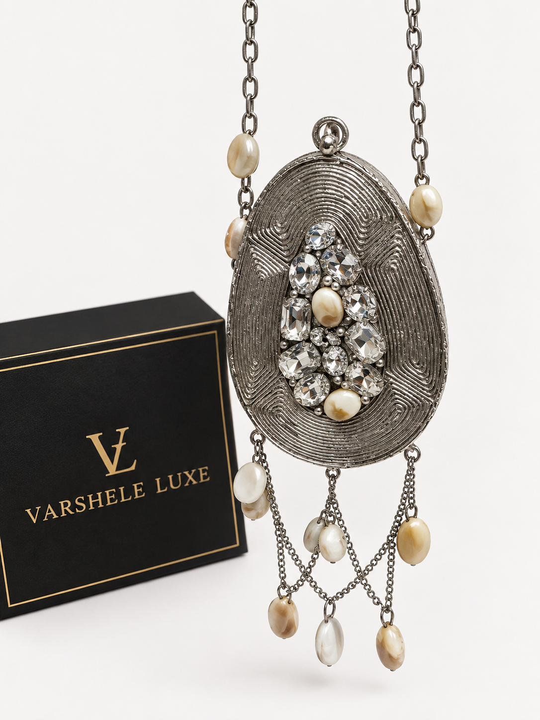 Pearl Cascade Embellished Mini Metal Clutch