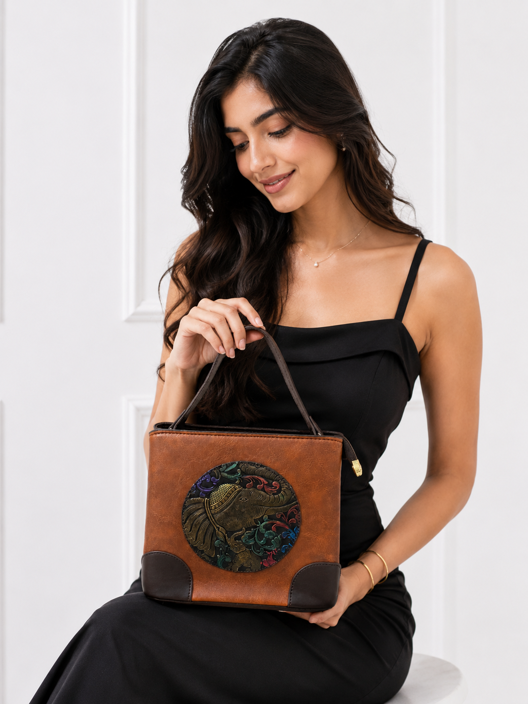 Brown embossed elephant bag