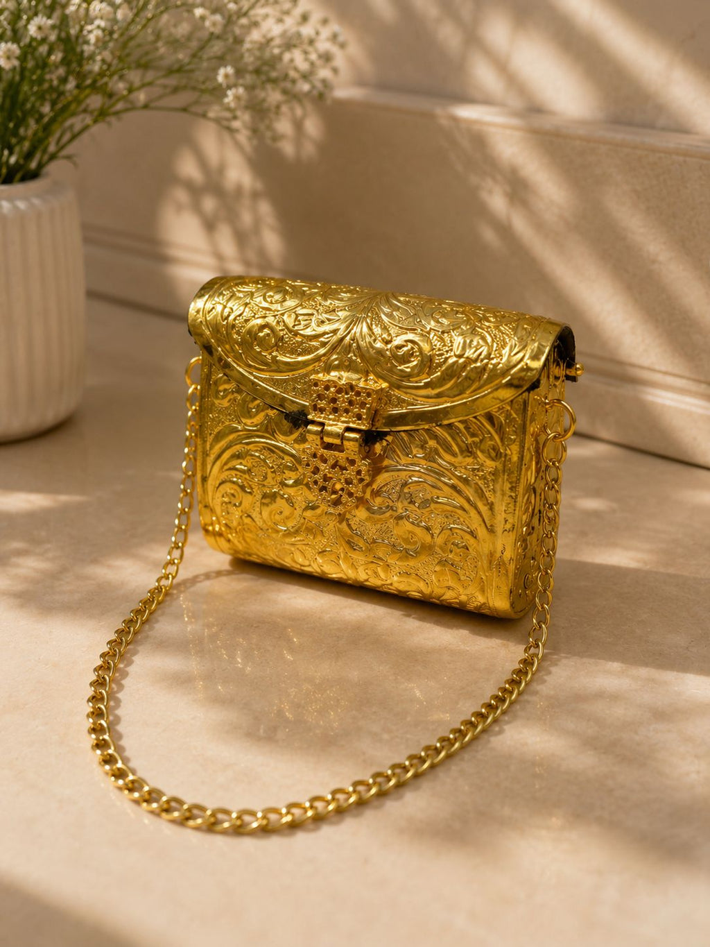 Gold metal clutch