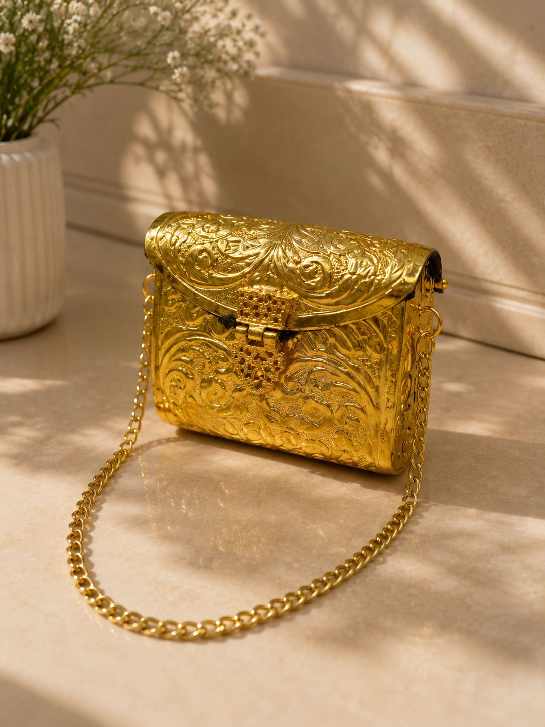 Gold metal clutch