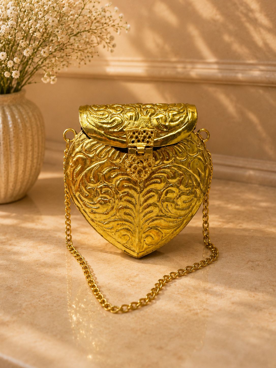 Gold metal clutch