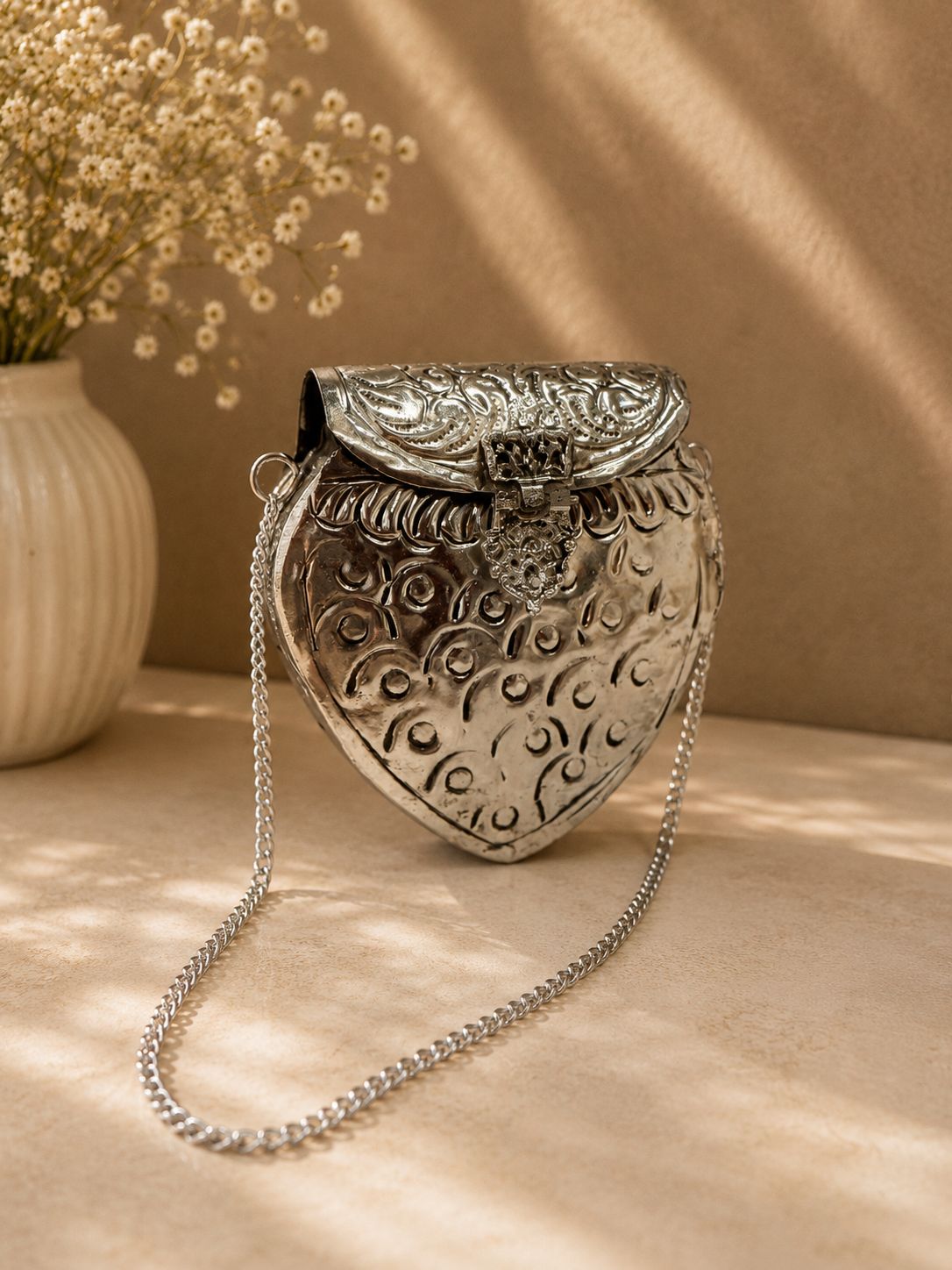 Silver metal clutch