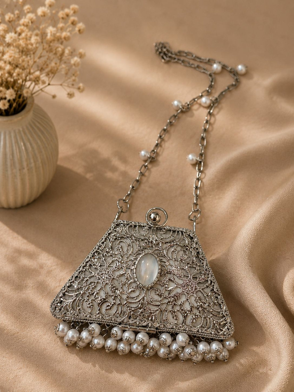 Silver metal clutch