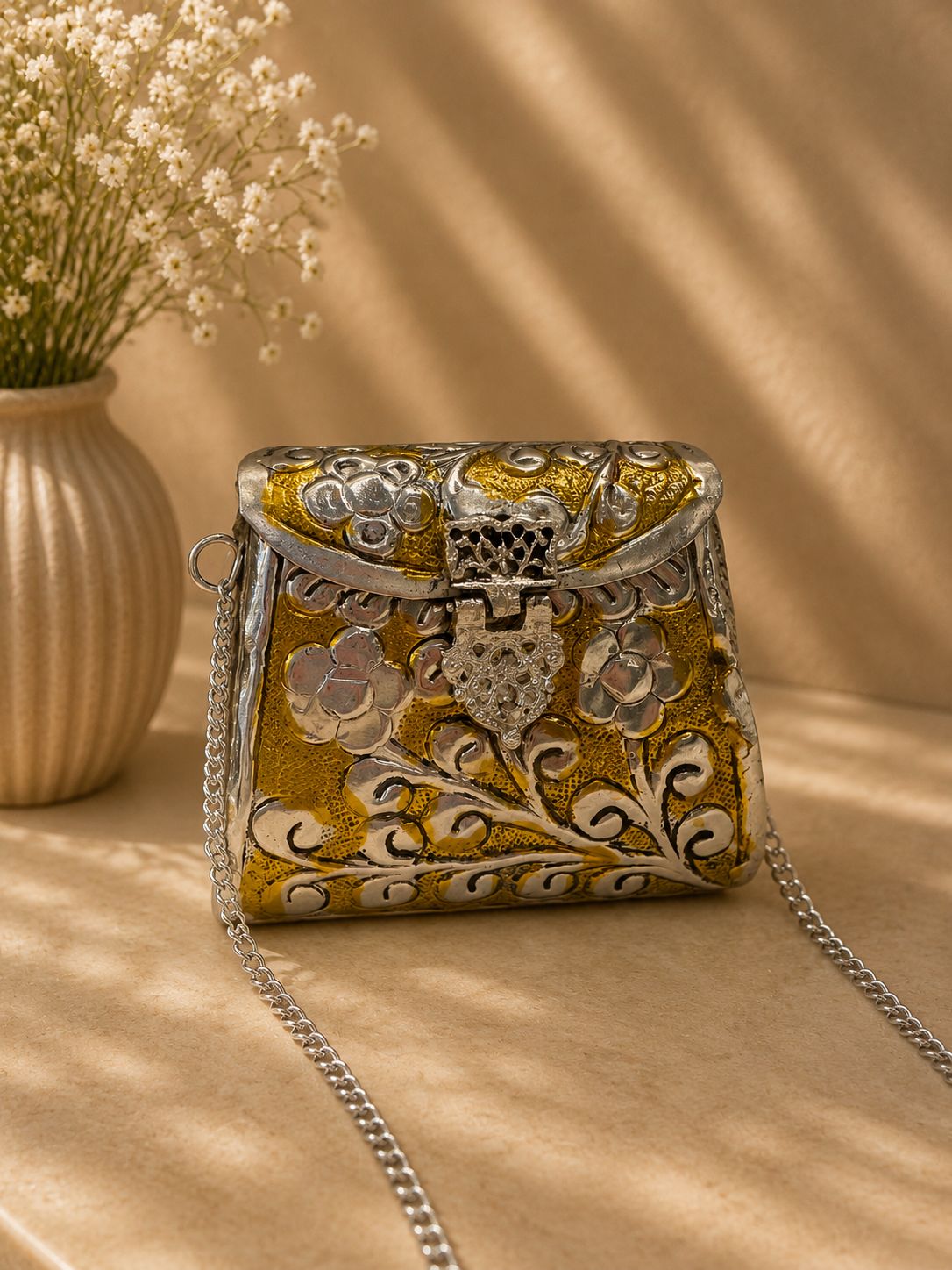 Gold silver metal clutch