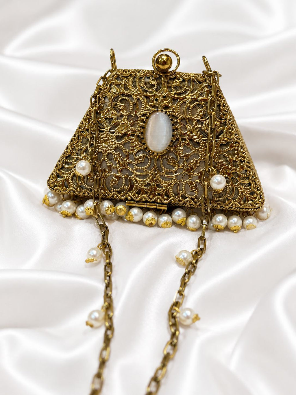 Gold metal clutch