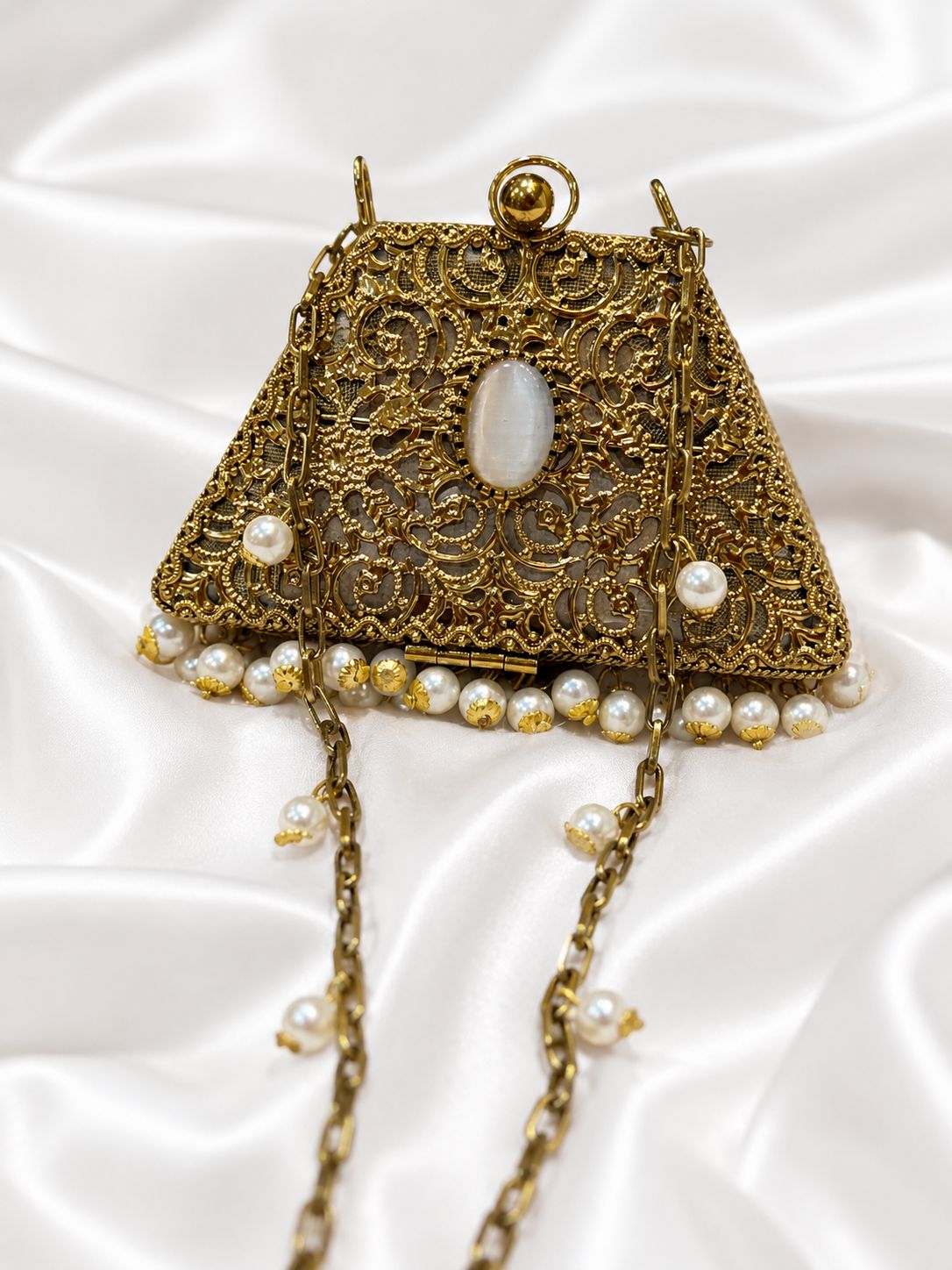 Gold metal clutch
