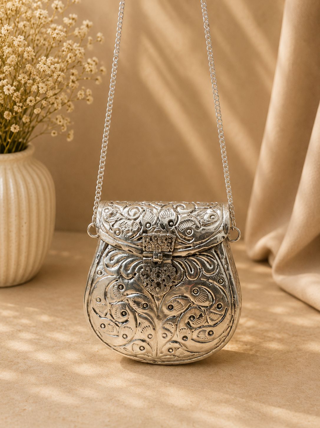 Silver metal clutch